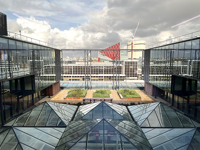 HUB victoria Sky Garden designed by Peter Dann structural engineers, with view of London skyline.