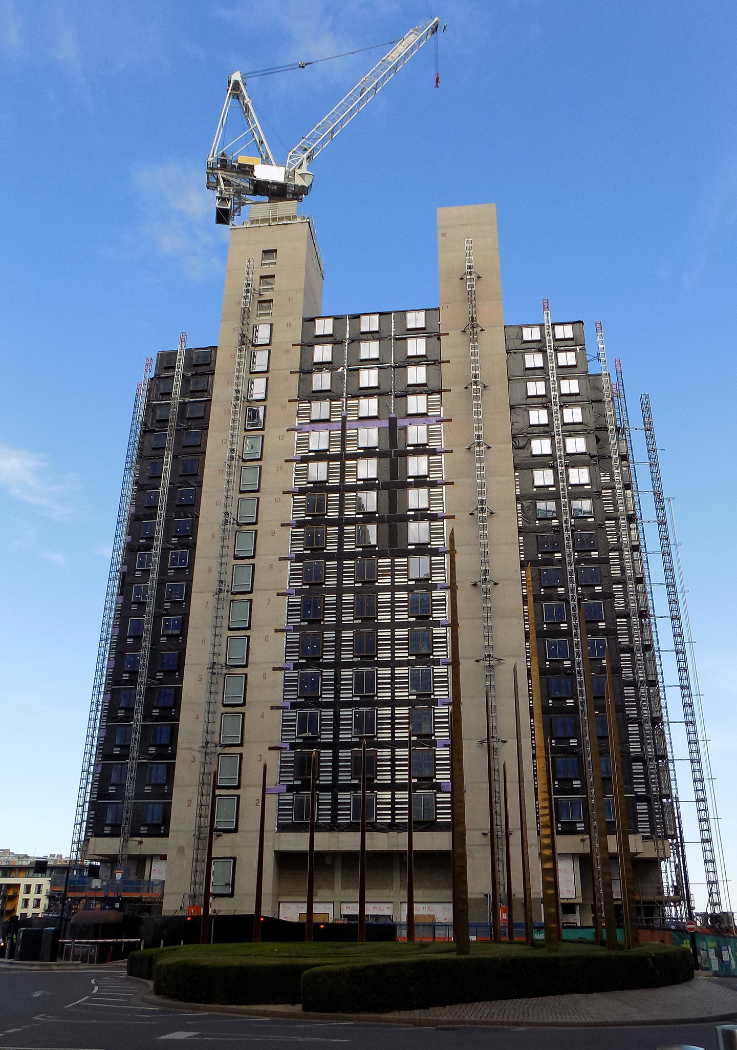 External photo of the B2 Wood Wharf modular tower with crane on roof