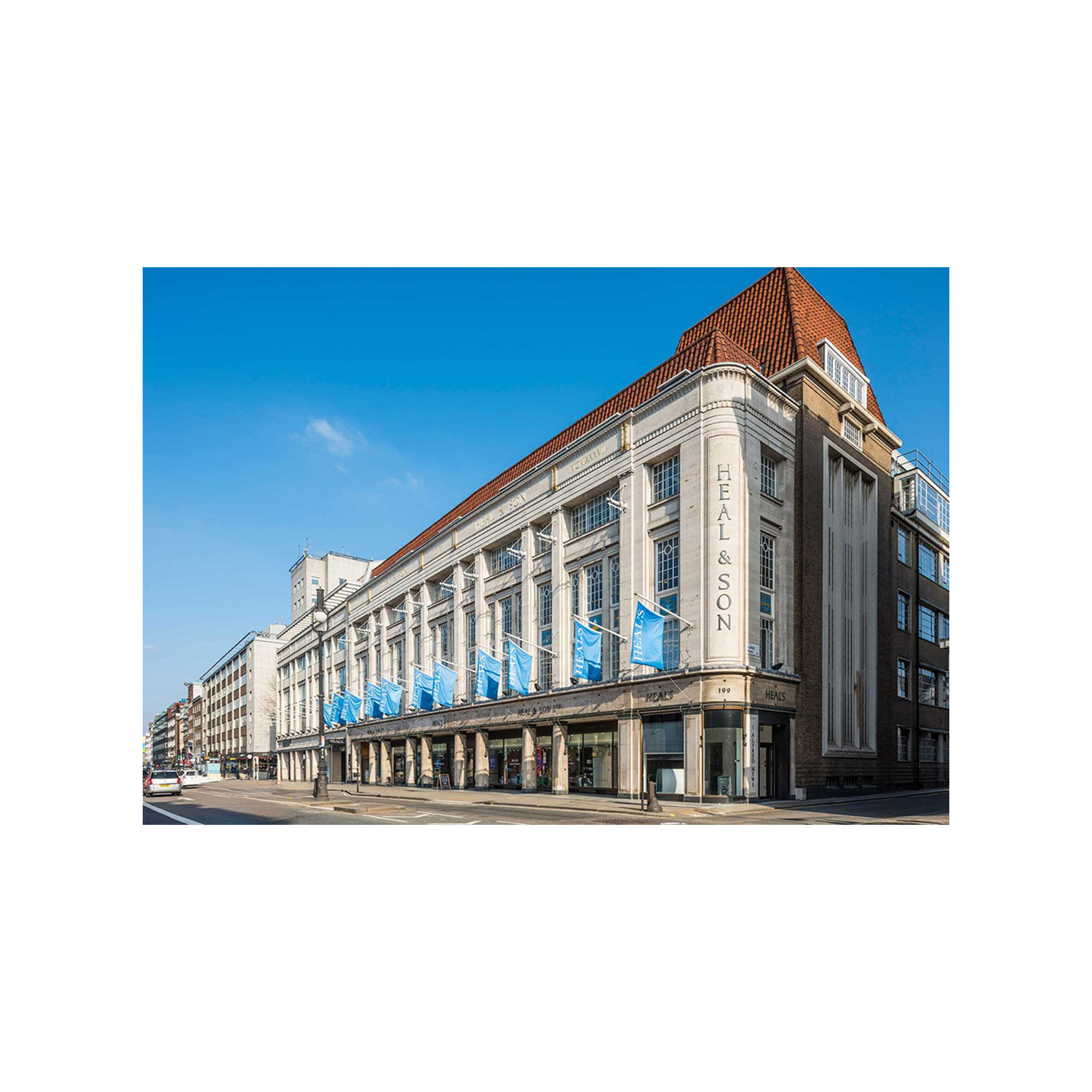 Refurbished Heals Building under a blue sky