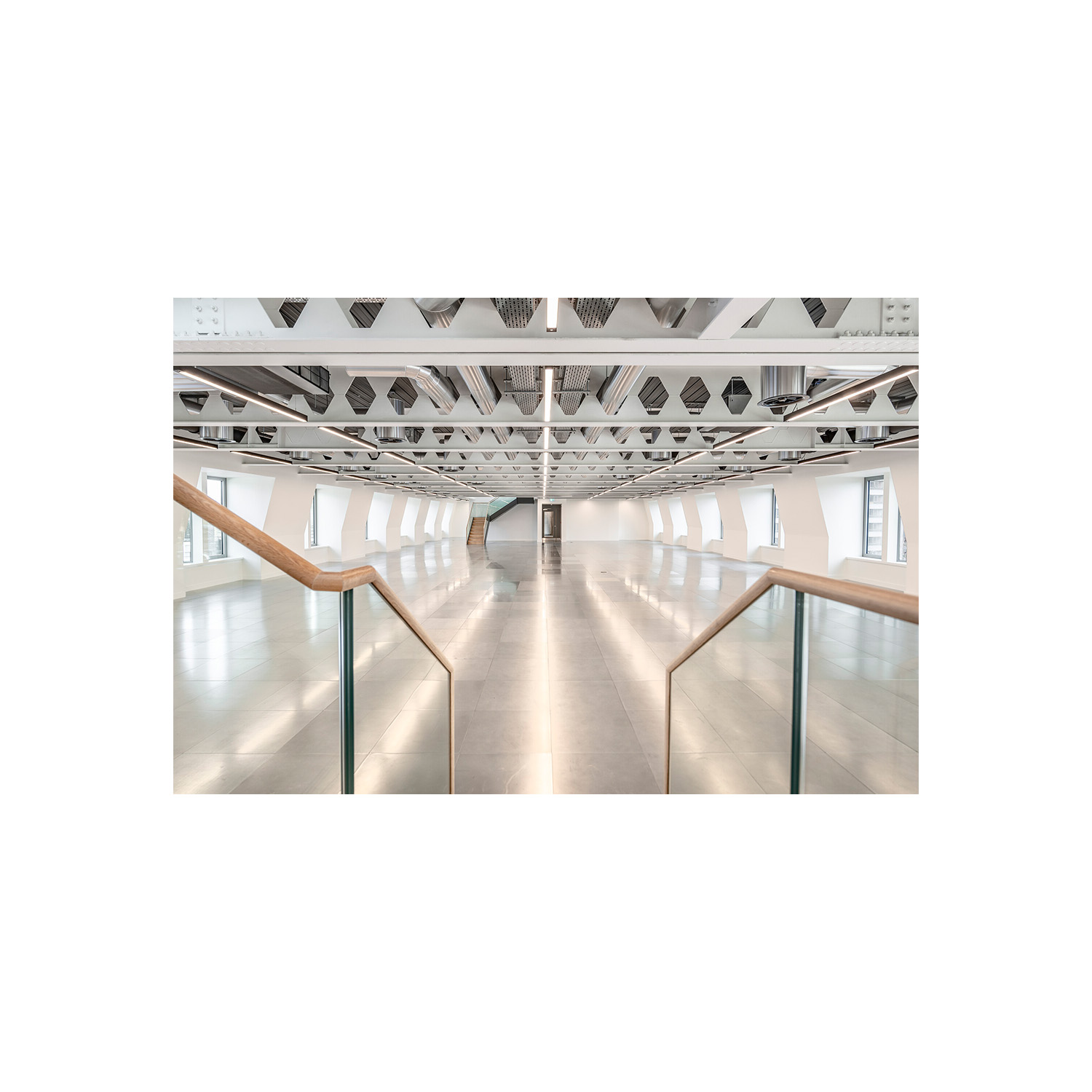 Office interior refurbishment in minimalist white and chrome beams