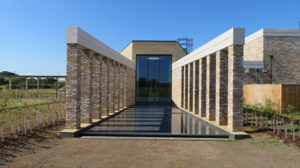 Oakfield Gardens Crematorium from outside with long water channel leading to the window of chapel