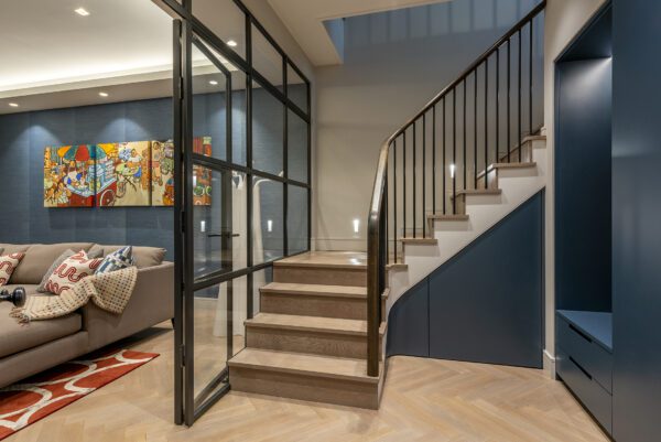 New basement cinema room with stair leading down