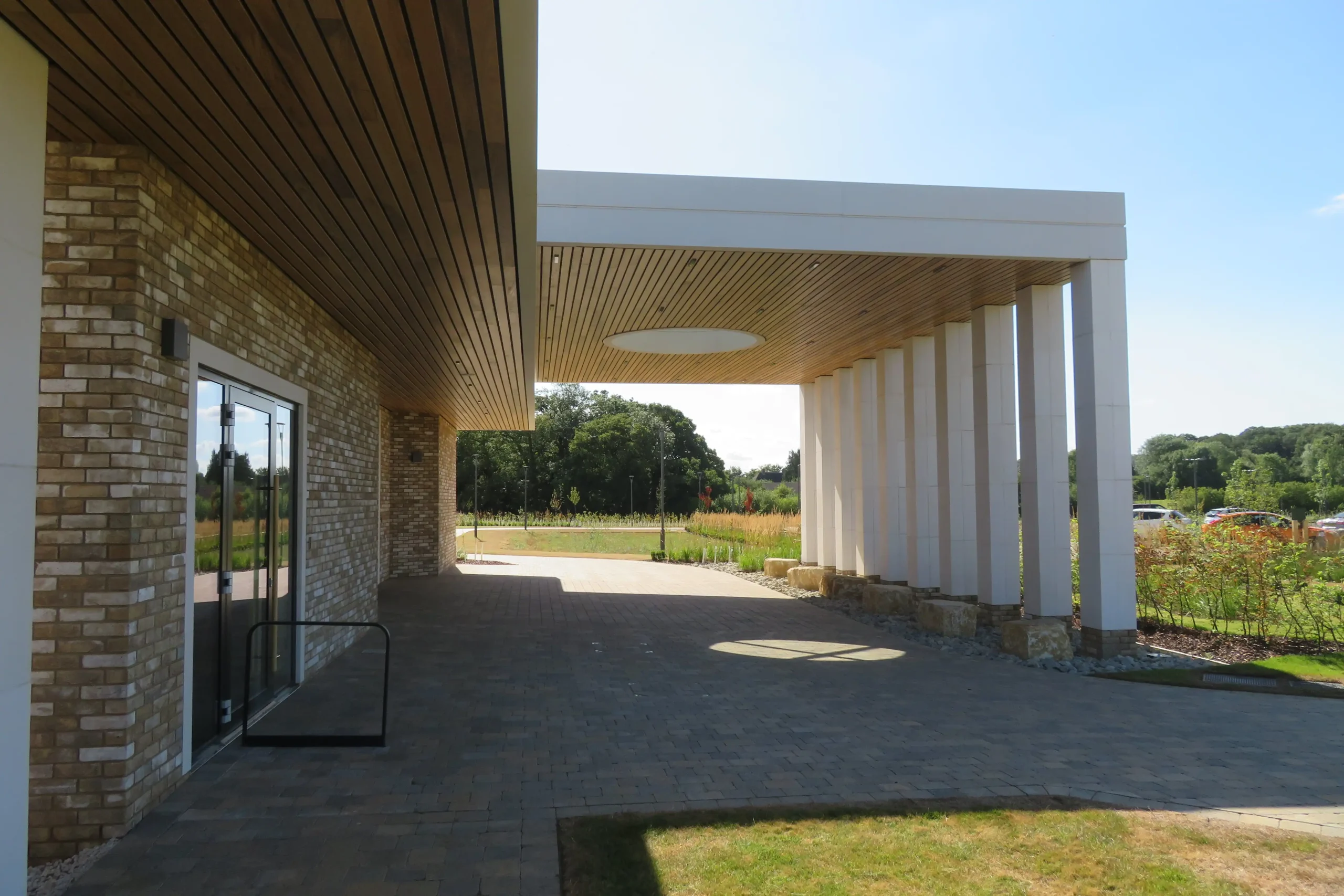 oakfield crematorium entrance architecture of white stone canopy and supporting columns