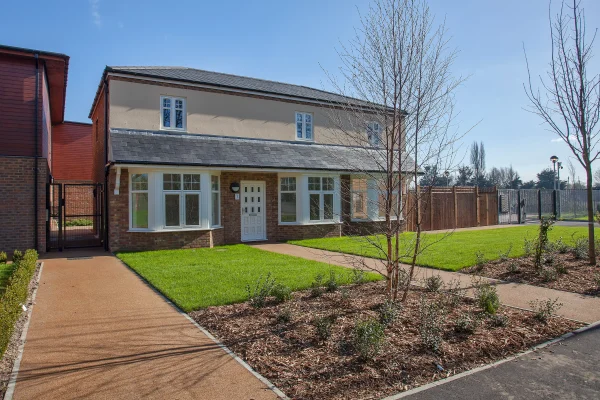 exterior of the anglers retreat converted into housing with landscaping