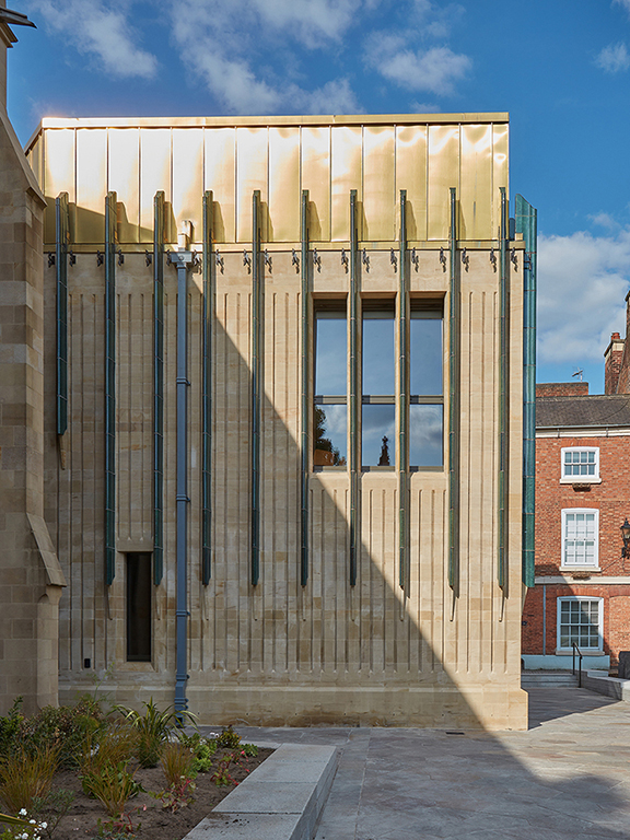 Leicester Cathedral heritage and learning extension from the side under sunlight